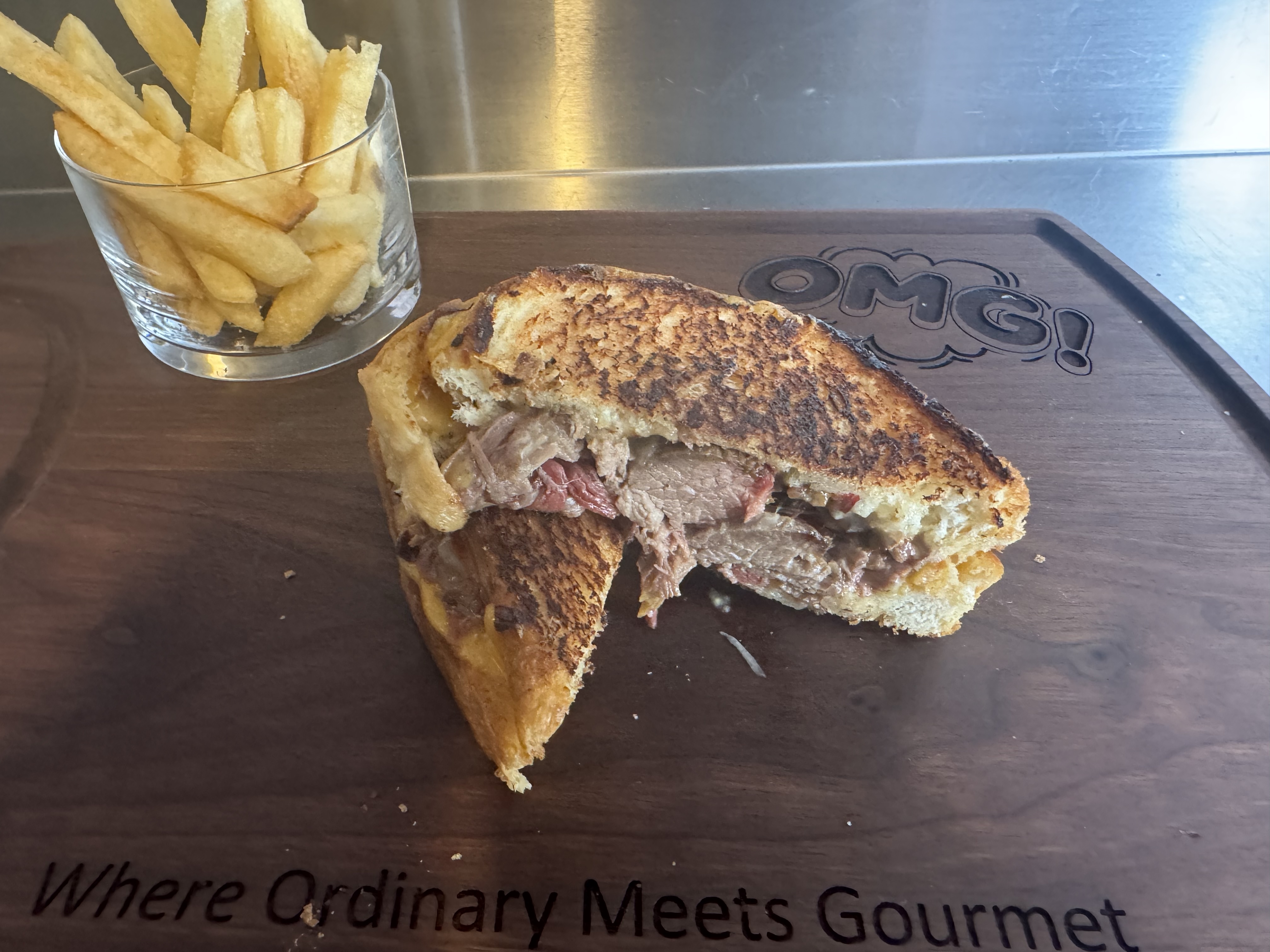 Toasted OMG sandwich with fries