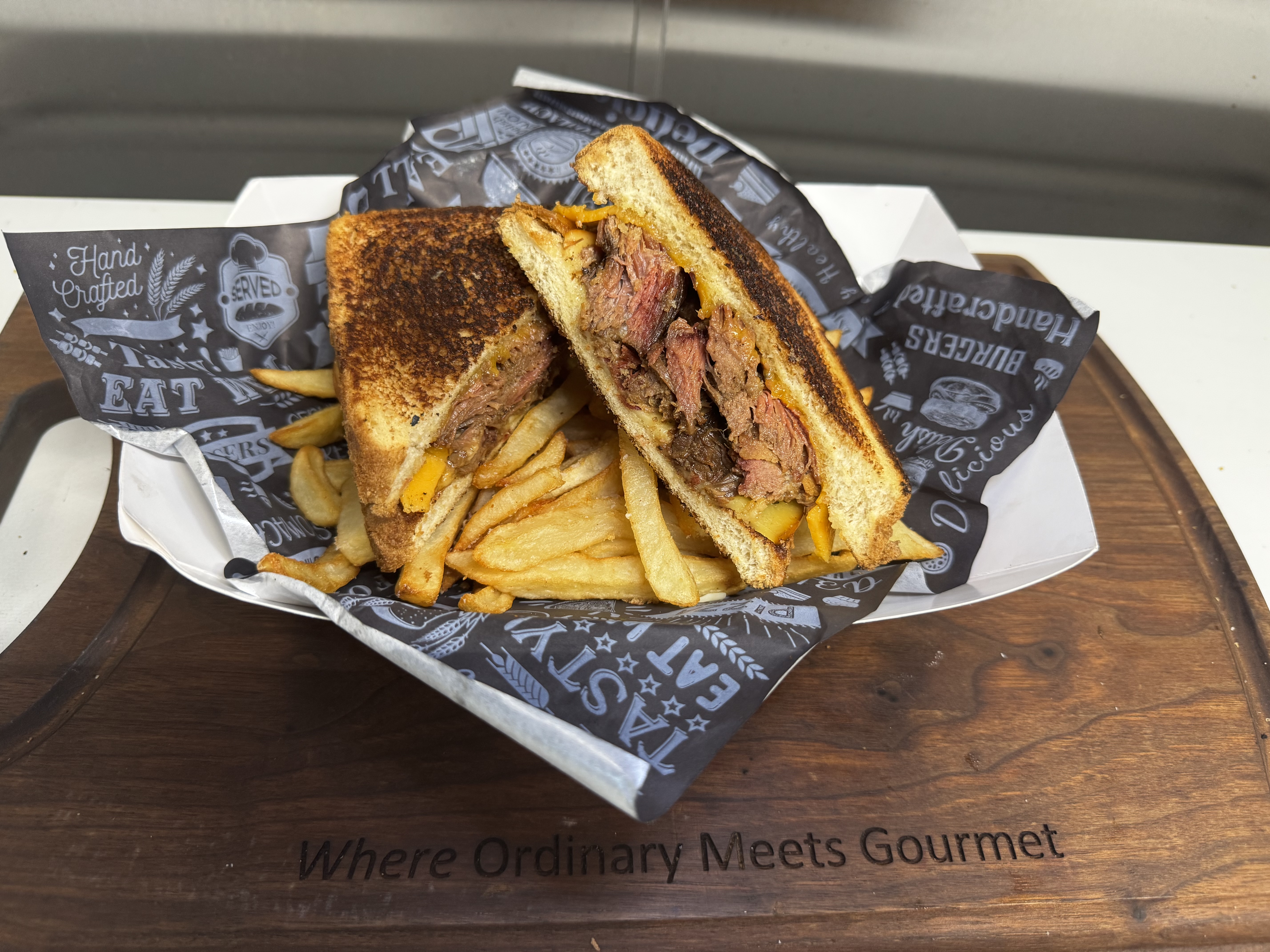 OMG Brisket Grilled Cheese sandwich with fries